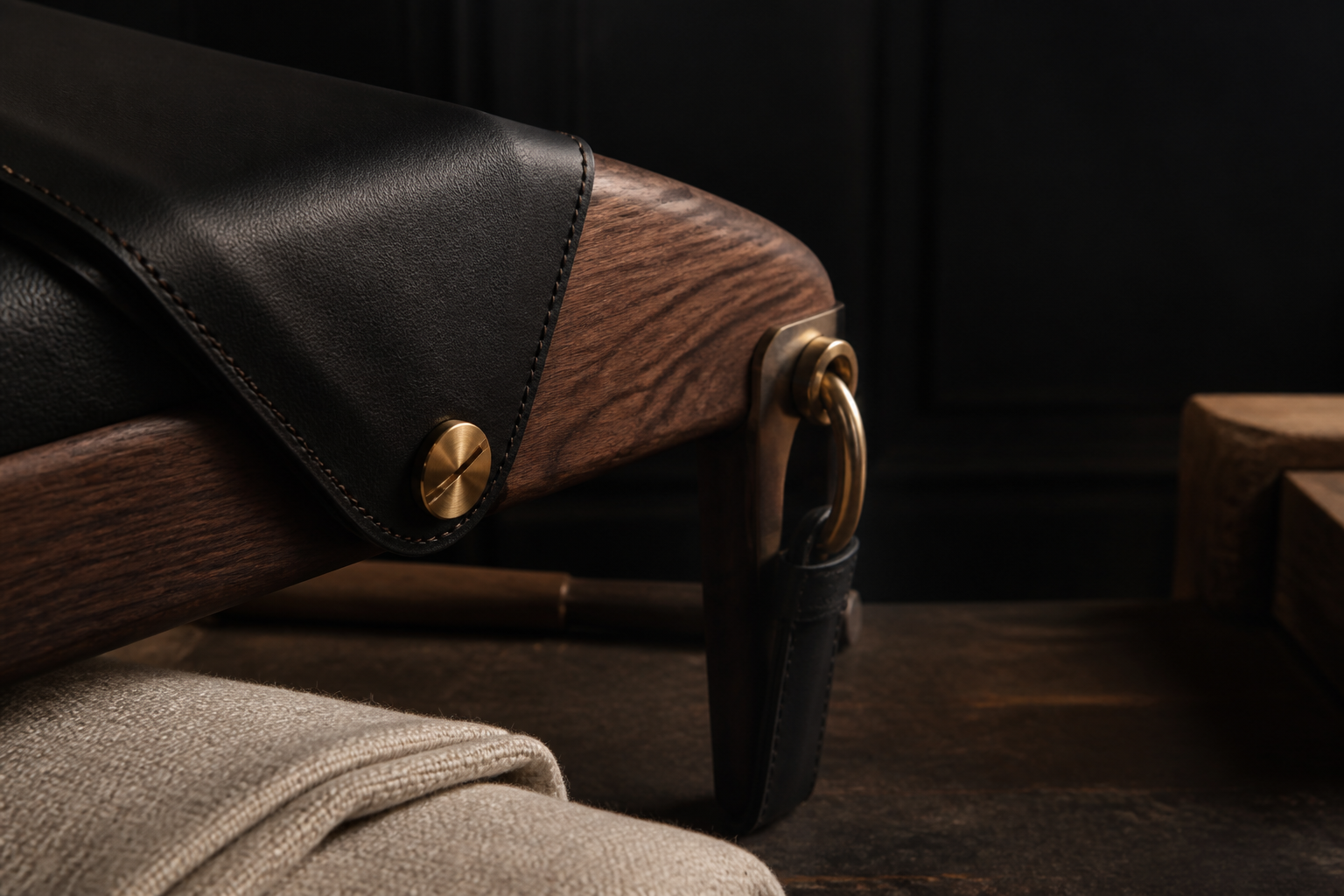 Black leather, walnut and bronze furniture details